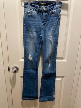 Indigo Rein Distressed Flare Jeans with Raw Notched Sides